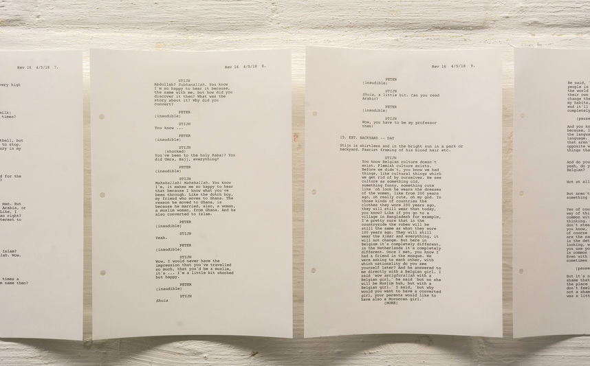 Signed contract displayed on a wall