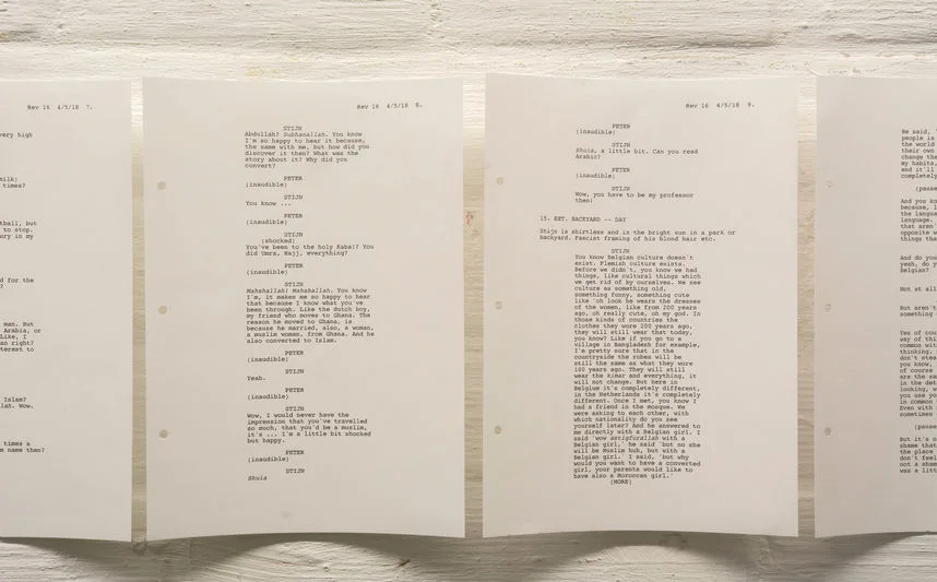 Signed contract displayed on a wall