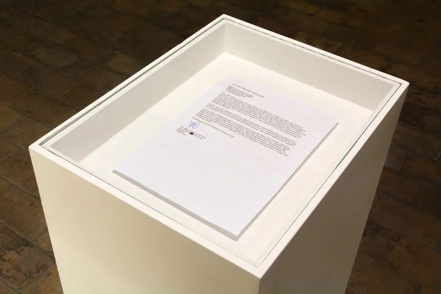 Script pages displayed on a wall