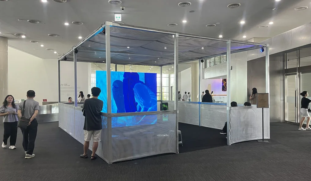 Crowd interacting with BAN♡ITS at Busan Biennale