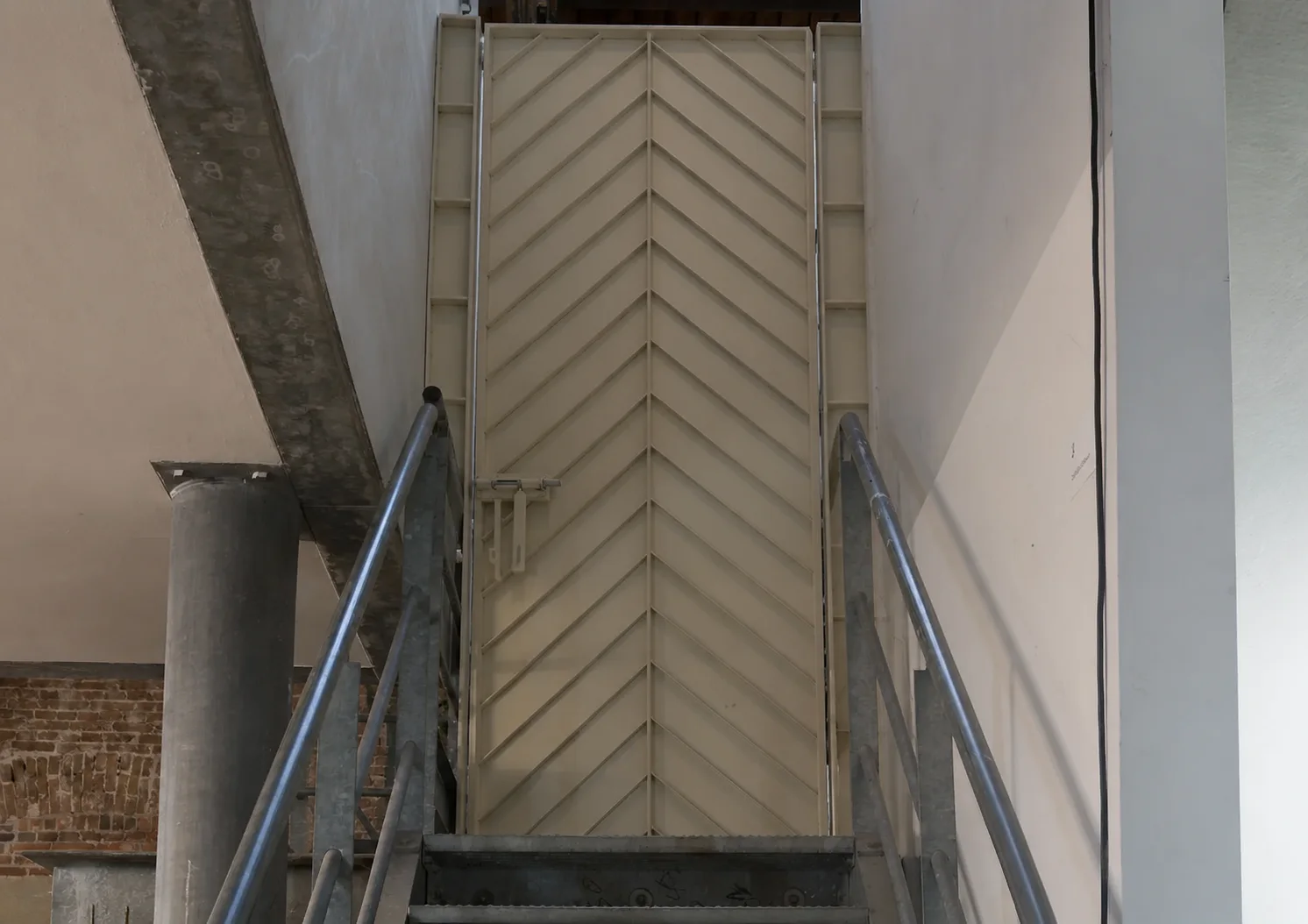 Welded steel front door installation