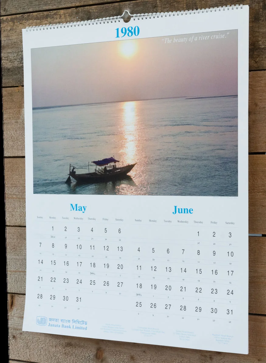Reconstructed Janata Bank calendar from 1980 opened to May and June