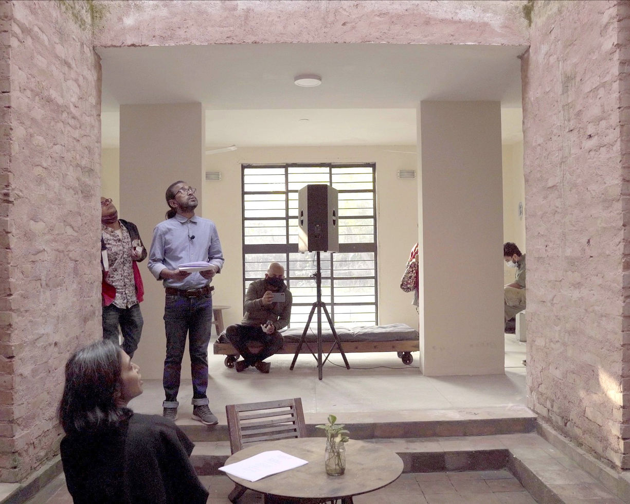 Two performers inside the Faydabad house