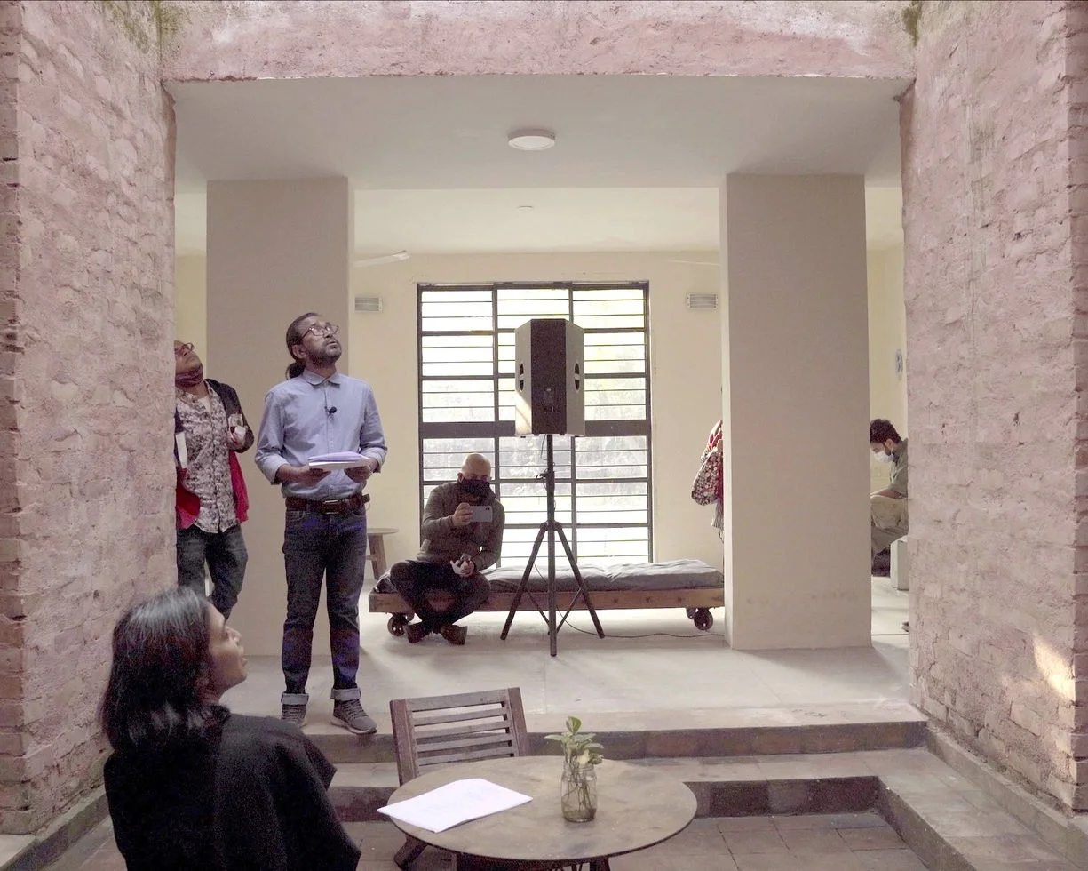 Two performers inside the Faydabad house