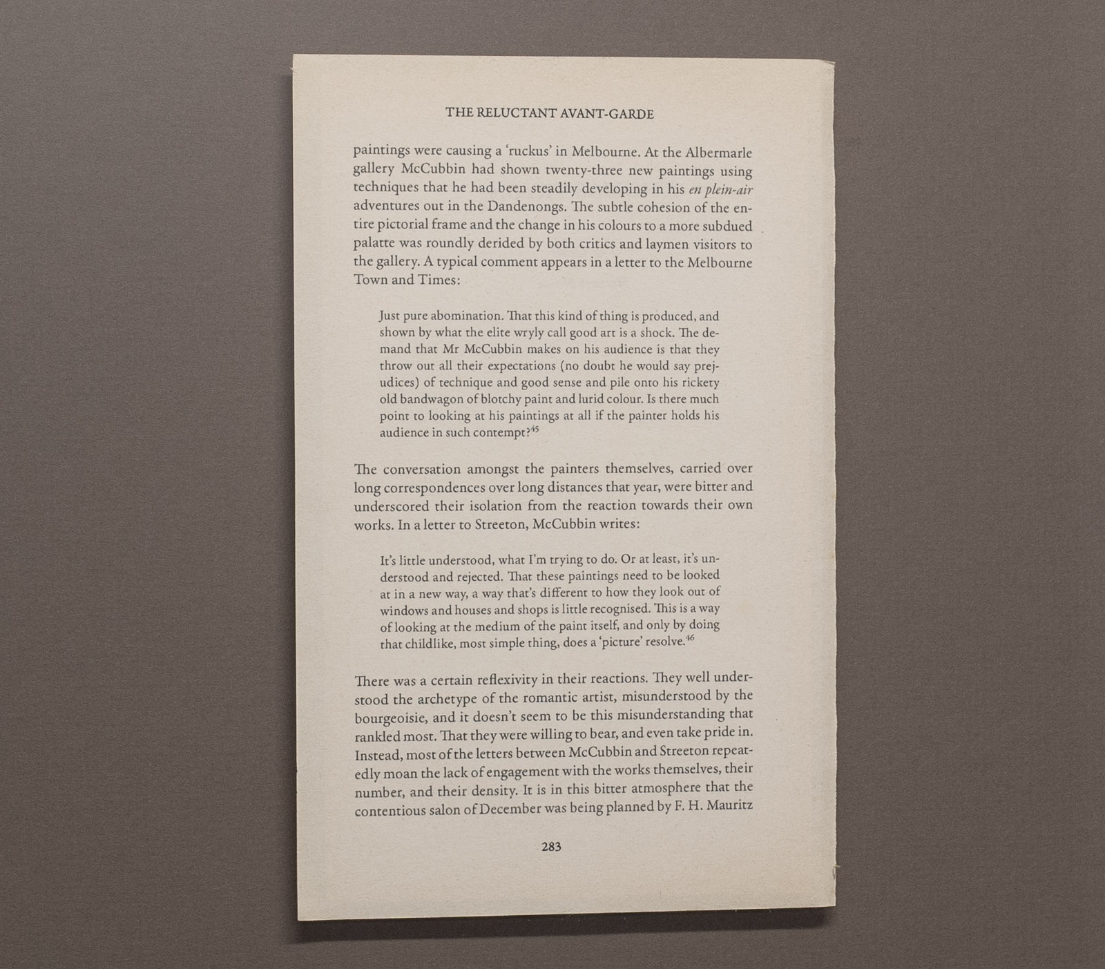 Detail of a fictional art-historical criticism printed on a reclaimed book page