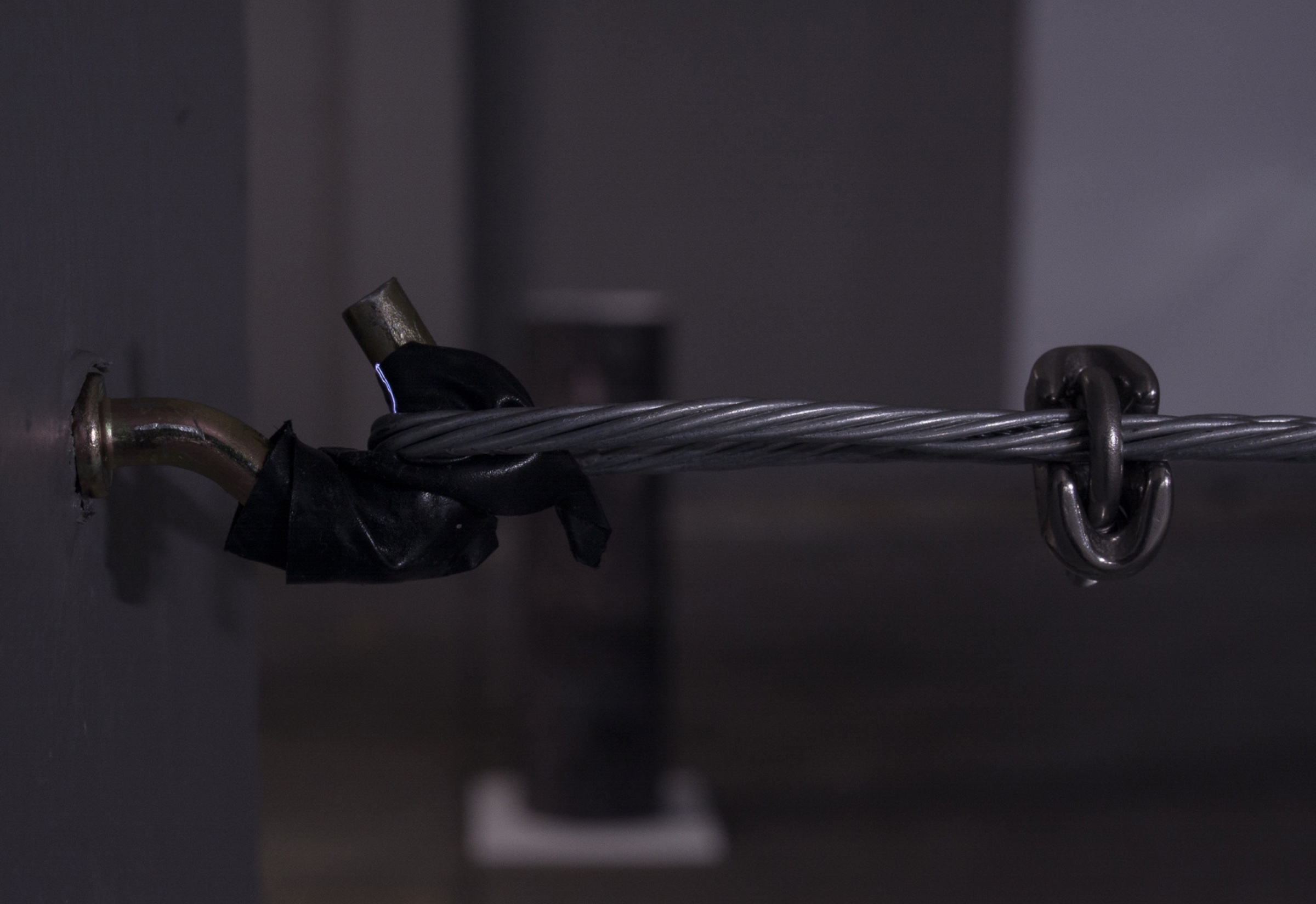 Tensioned steel wire installation in the car park