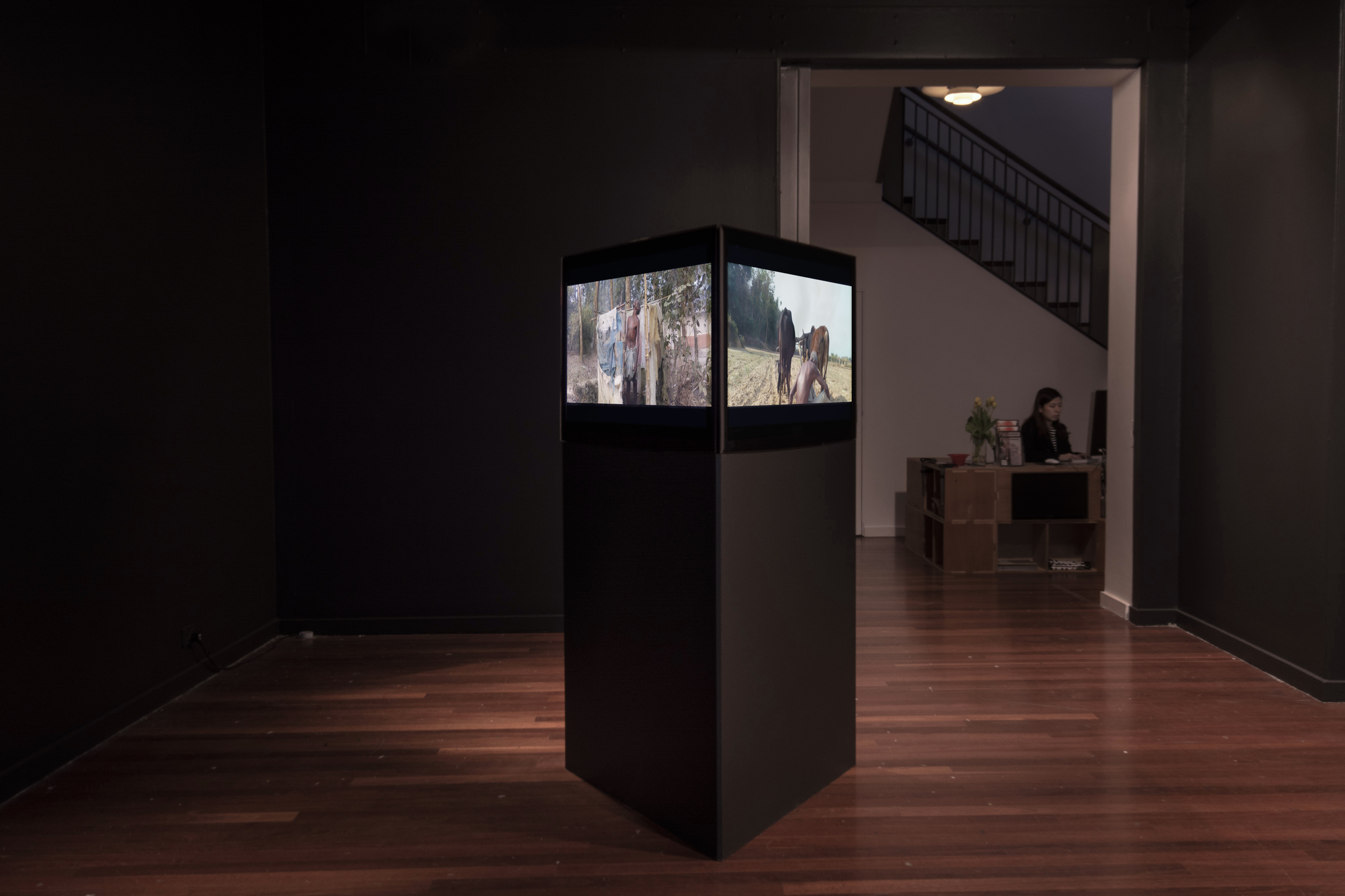 Three-channel installation view of Vastness in Eclipse at 4A