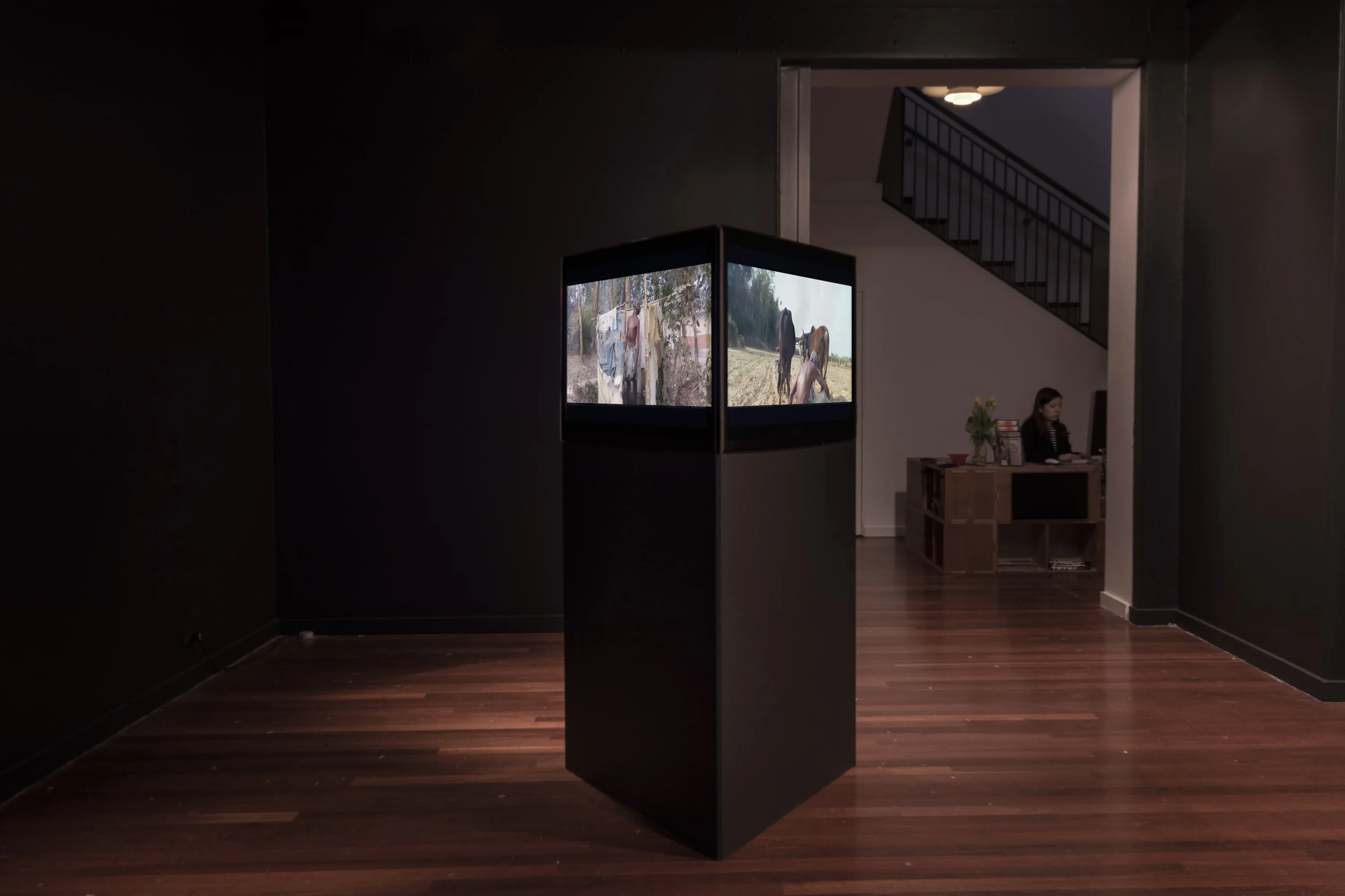 Three-channel installation view of Vastness in Eclipse at 4A